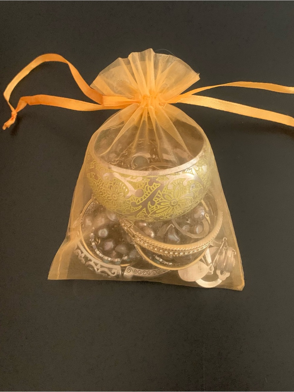 Sheer Organza Jewelry Gift Bag with Mixed Gold-Tone Bracelets